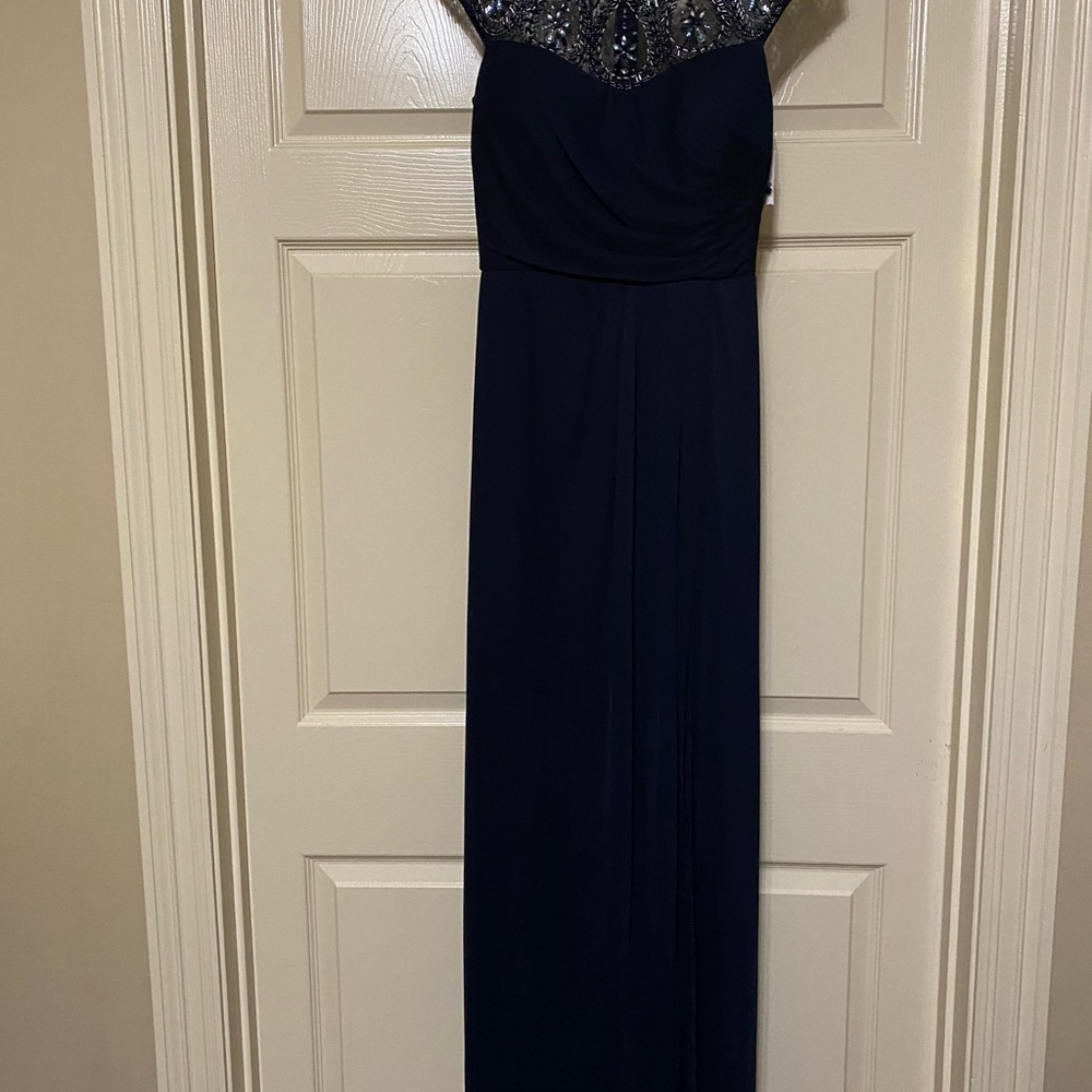 Navy Sheath Dress, Brand is Xscape. Back zipper and has lining.  Size 8.